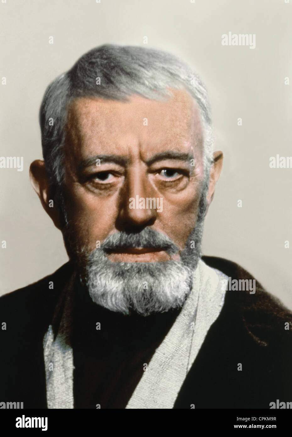 A portrait of Sir Alec Guinness in the 1977 film Star Wars. He is playing the role of the Jedi Knight, Ben Obi-Wan Kenobi. Stock Photo