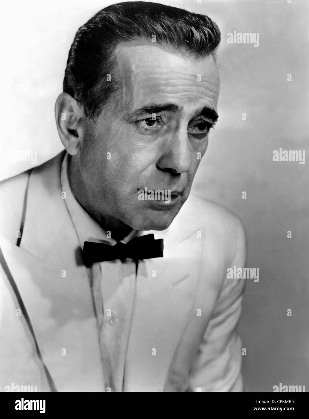A black and white portrait of the film star Humphrey Bogart taken in Los Angeles in 1944. Stock Photo