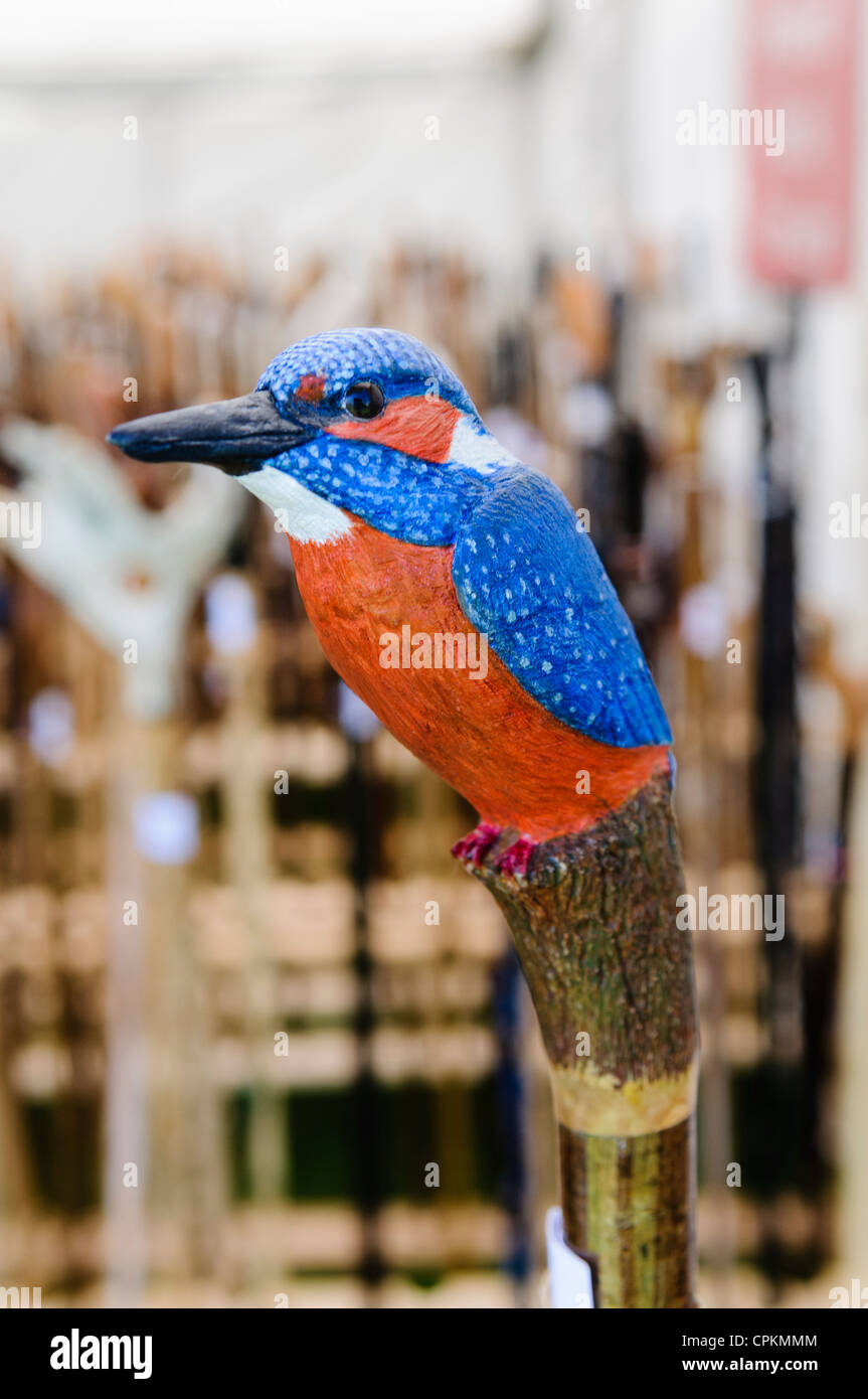 Walking stick with end carved and painted as a Kingfisher Stock Photo