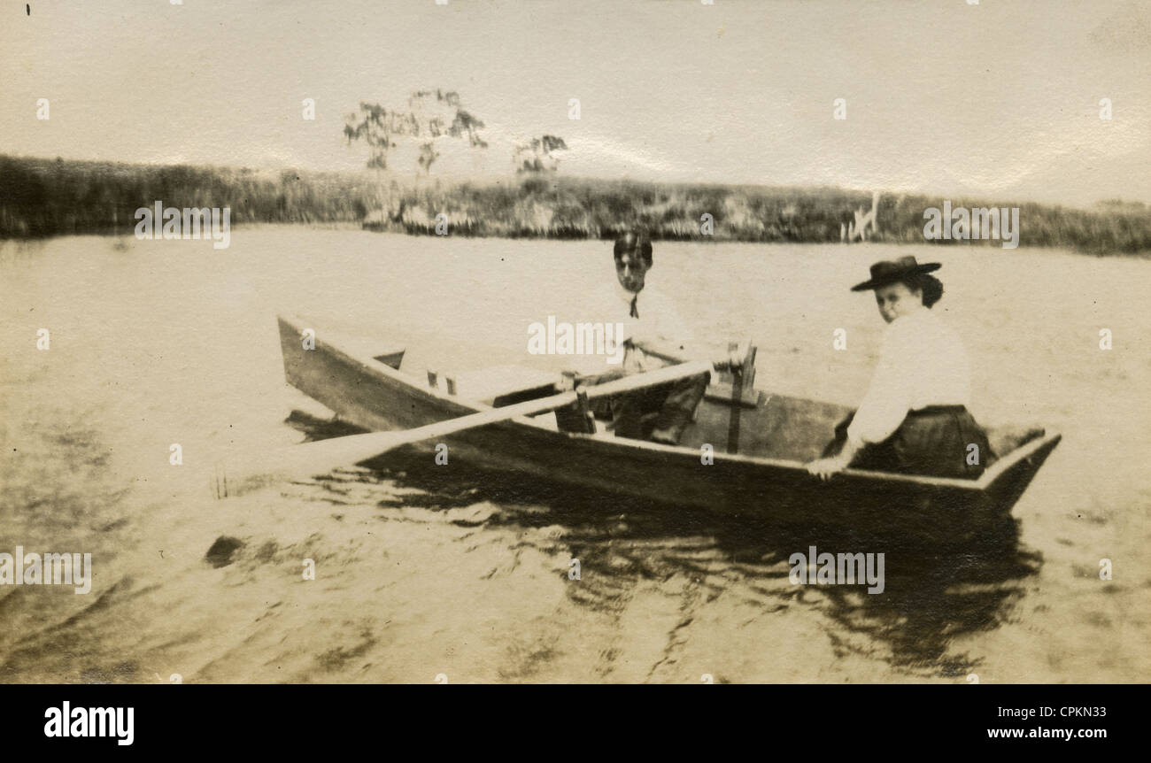 1907 photograph, rowing on Cut River. Cut River is a Channel in Plymouth County, Massachusetts. Stock Photo