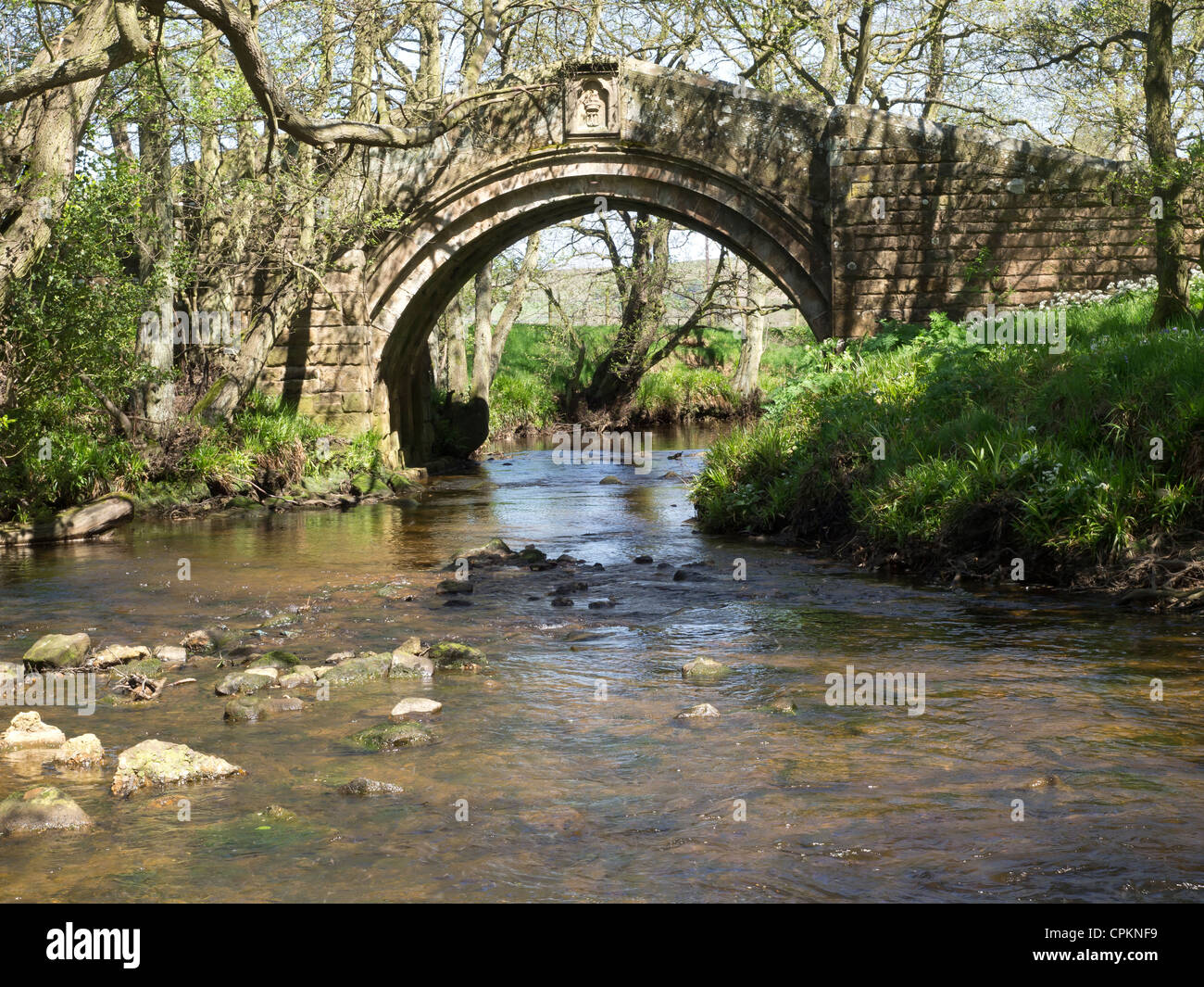 Medieval Hunters Sty bridge at Westerdale in the North Yorkshire Moors National Park restored by the Duncombe family in the 19C Stock Photo