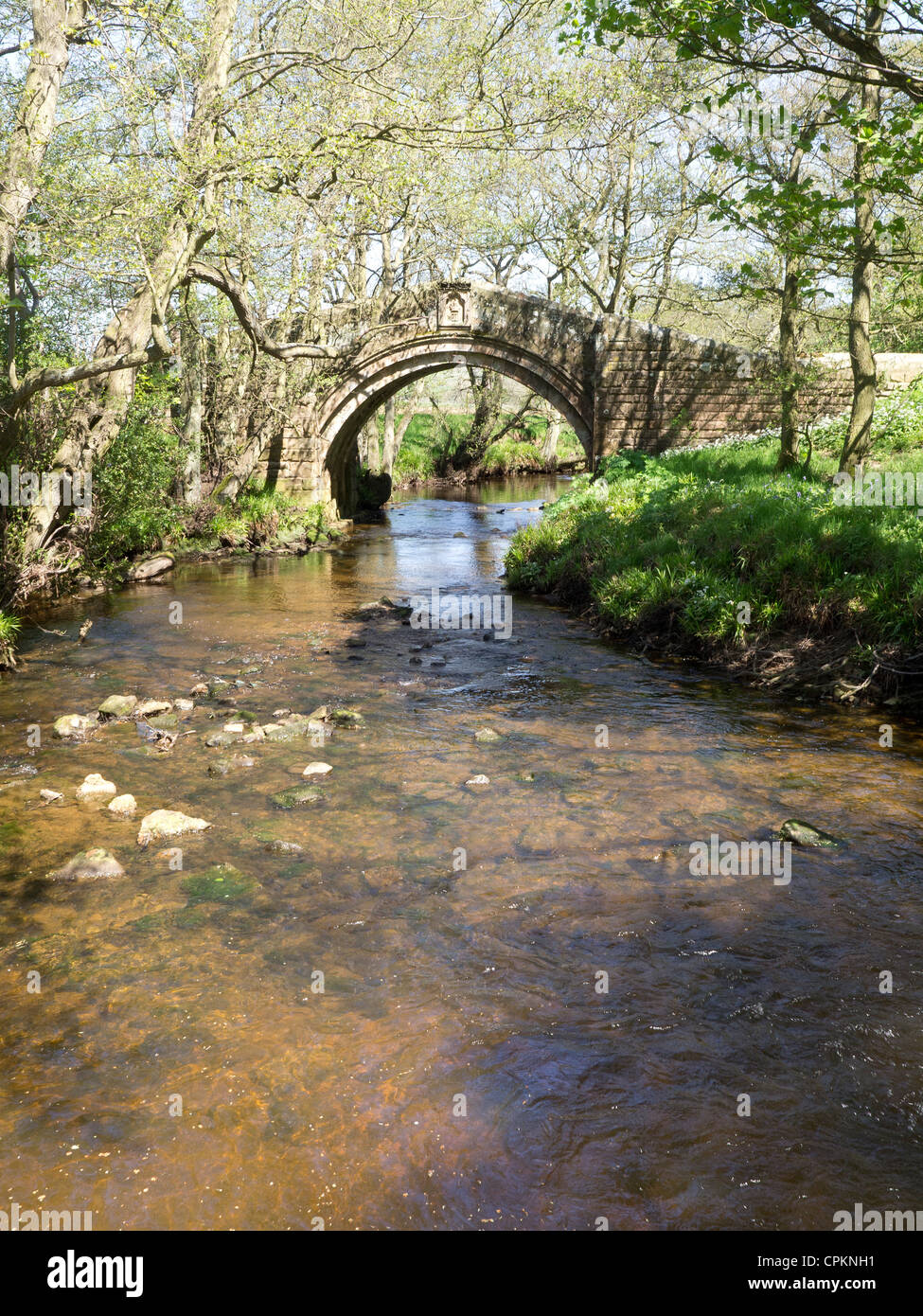 Medieval Hunters Sty bridge at Westerdale in the North Yorkshire Moors National Park restored by the Duncombe family in the 19C Stock Photo