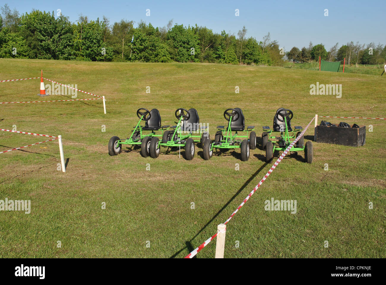 peddle go carts on a grass racing track Stock Photo