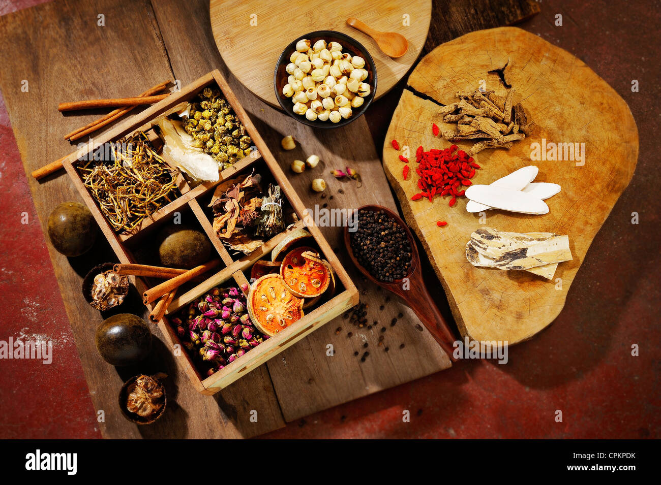 Chinese herbal medicine and flower tea on wooden Stock Photo Alamy