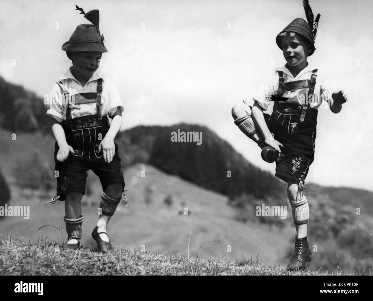 Two boys performing Schuhplattln, 1933 Stock Photo