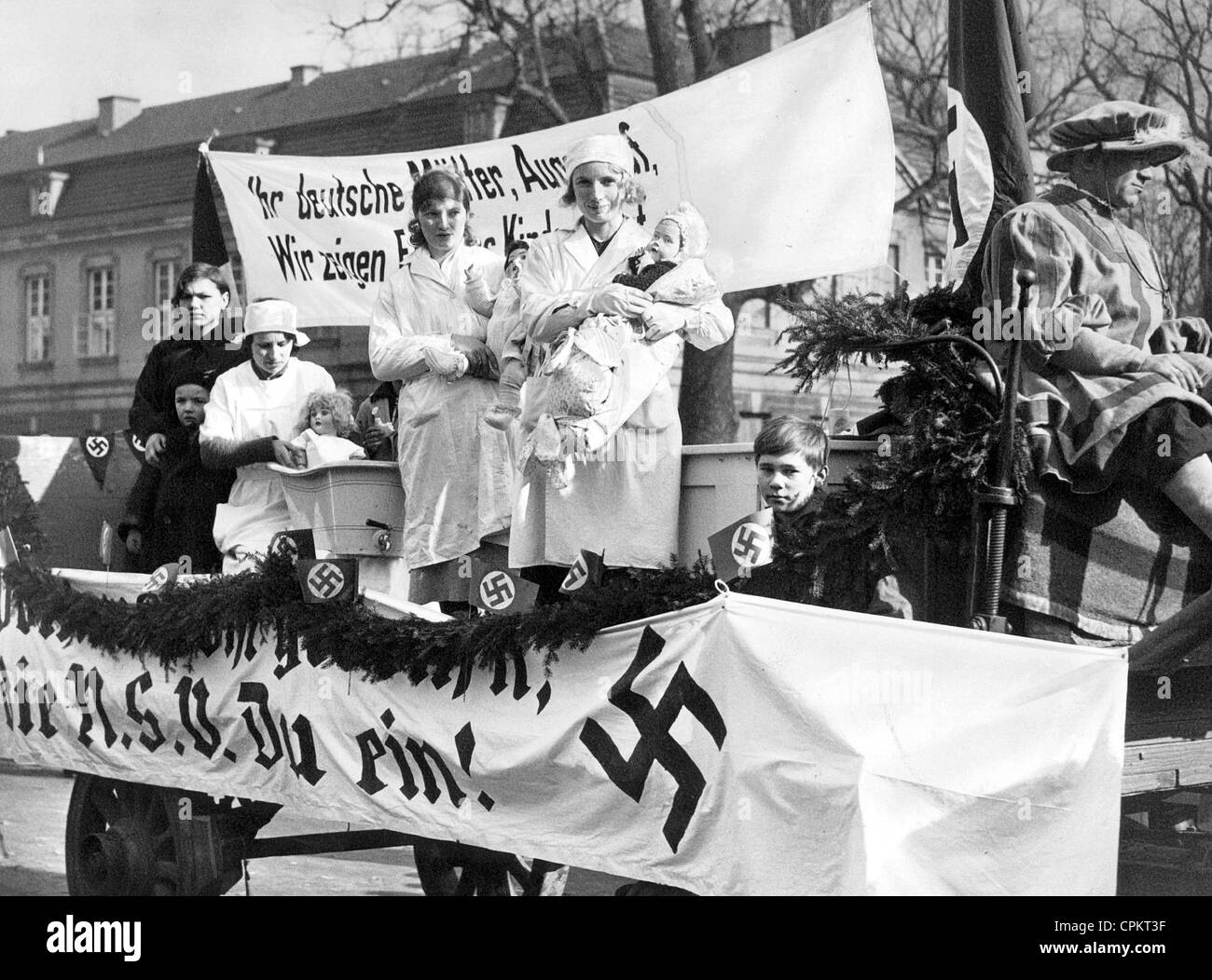 Car with a banner of the National Socialist People's Welfare Stock Photo
