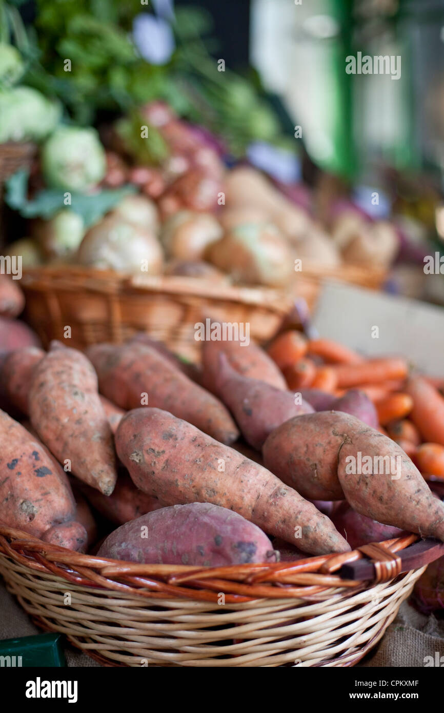Organic vegetables for sale in baskets. Stock Photo