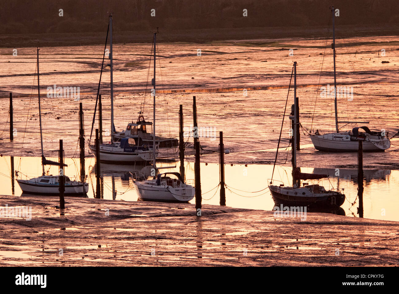 yachts moored up a creek Portsmouth Harbour Portchester Stock Photo