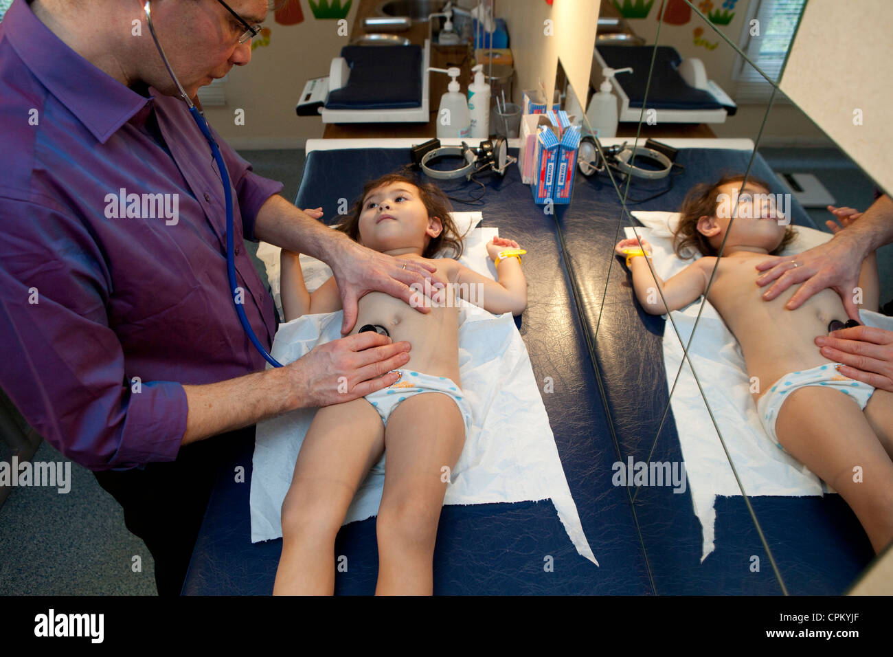 ABDOMEN PALPATION, CHILD Stock Photo. 