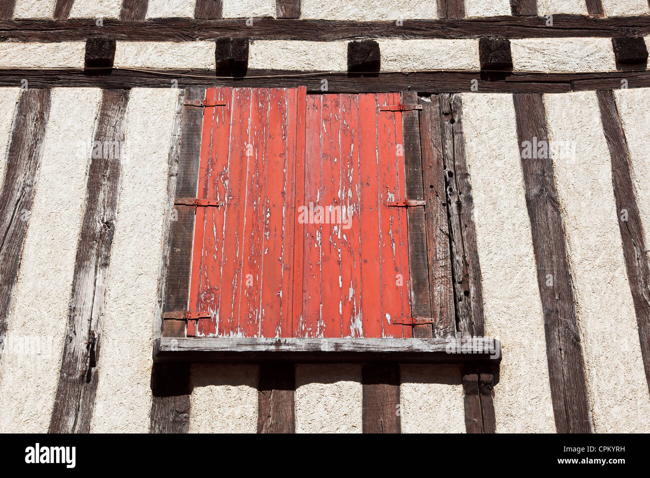 Window with shutters closed on a house in France Stock Photo