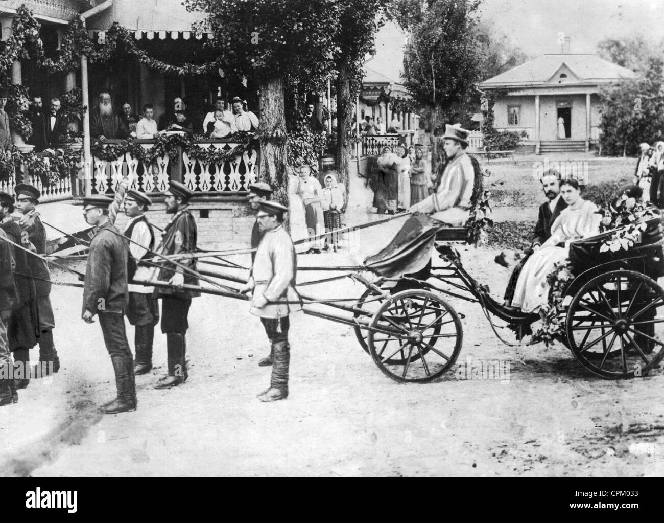 Serfs in front of the carriage of a landowner in Russia, 1872 Stock Photo