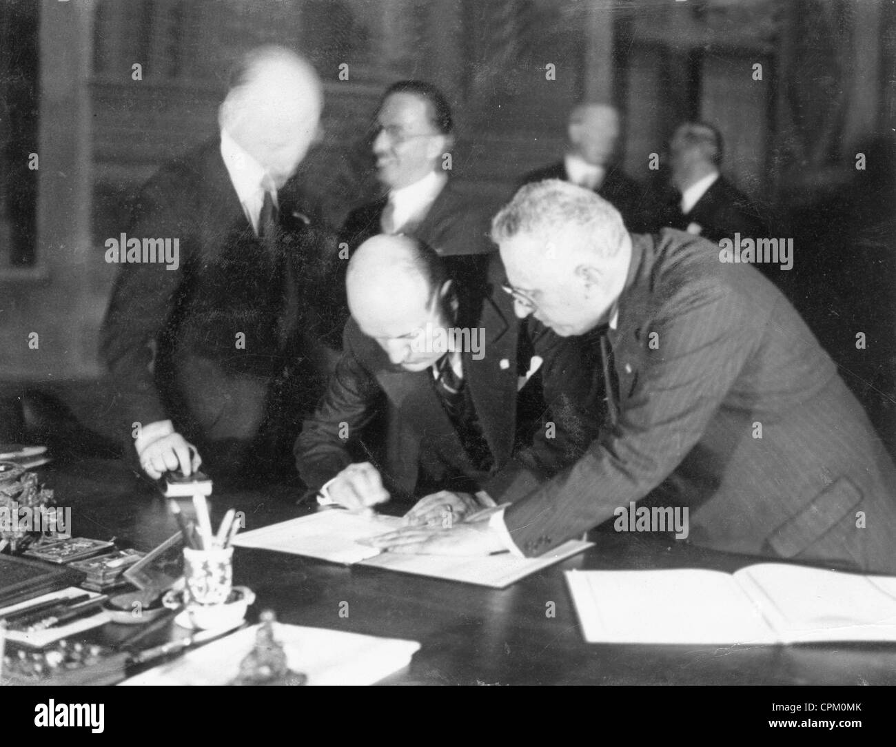 Benito Mussolini signs the Four Power Pact, 1933 Stock Photo