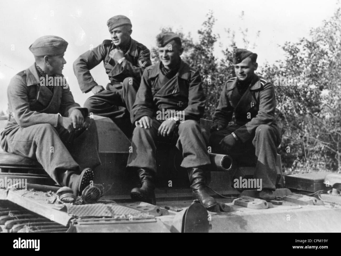 German assault gun crew on their tank, 1941 Stock Photo