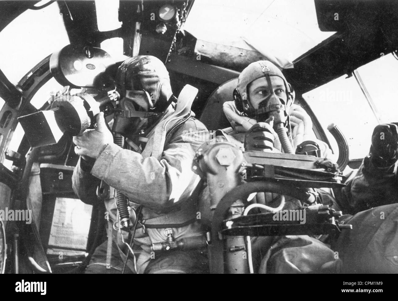 German cameraman films in an aircraft of the Luftwaffe, 1940 Stock Photo