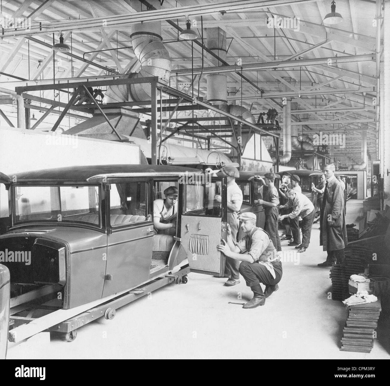 Car production in a factory in Germany, 1928 Stock Photo