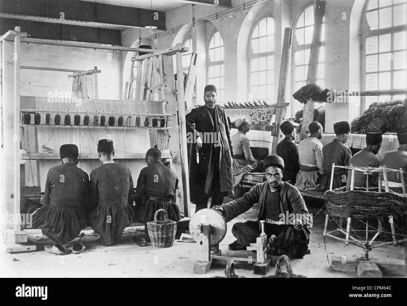 Iran Rug Making Rug production in Iran, 1931 Stock Photo - Alamy