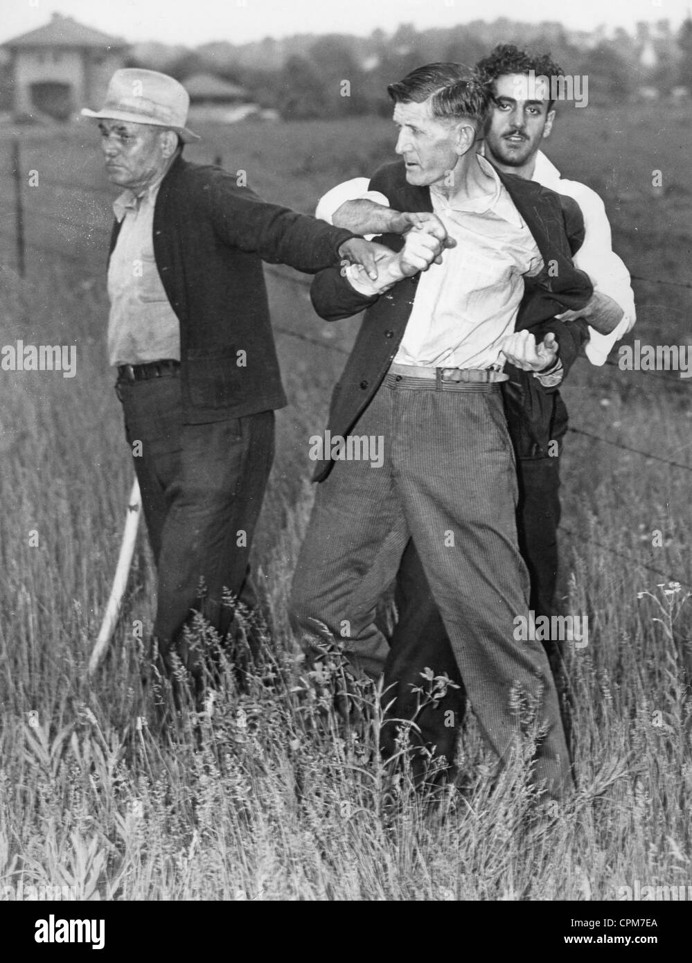 Owner of a farm is resisting the forced sale, 1937 Stock Photo