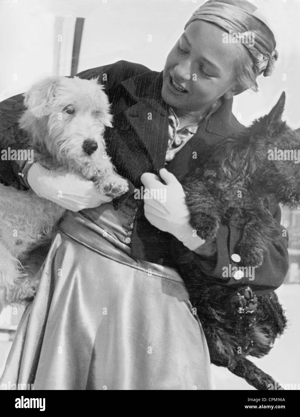 Maxi Herber with two dogs, 1930s Stock Photo