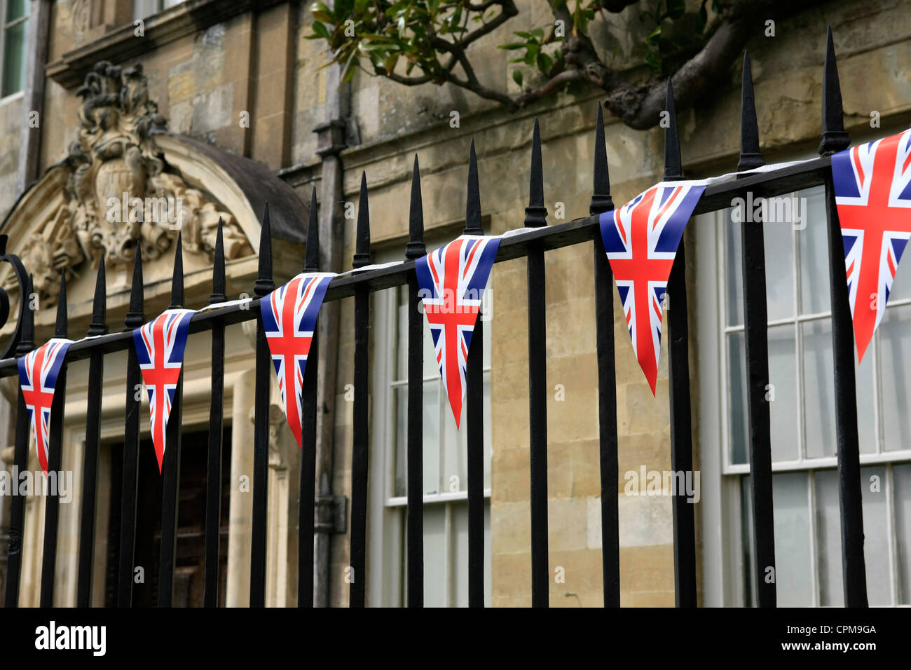 English Union Jack flag Pennants hang from railings during the Queen's
