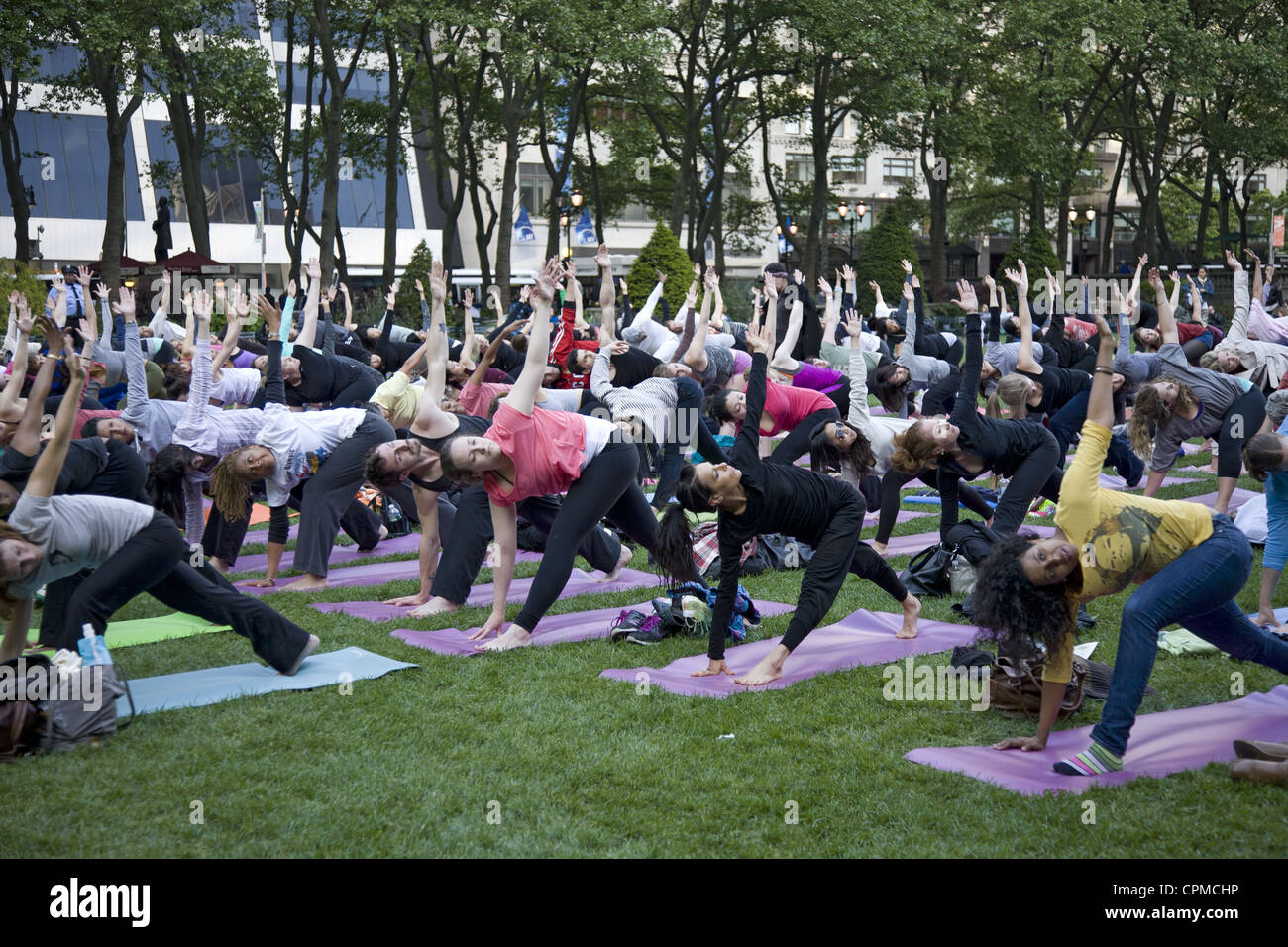 Free yoga classes every week in Bryant Park in Manhattan have very popular Stock Photo