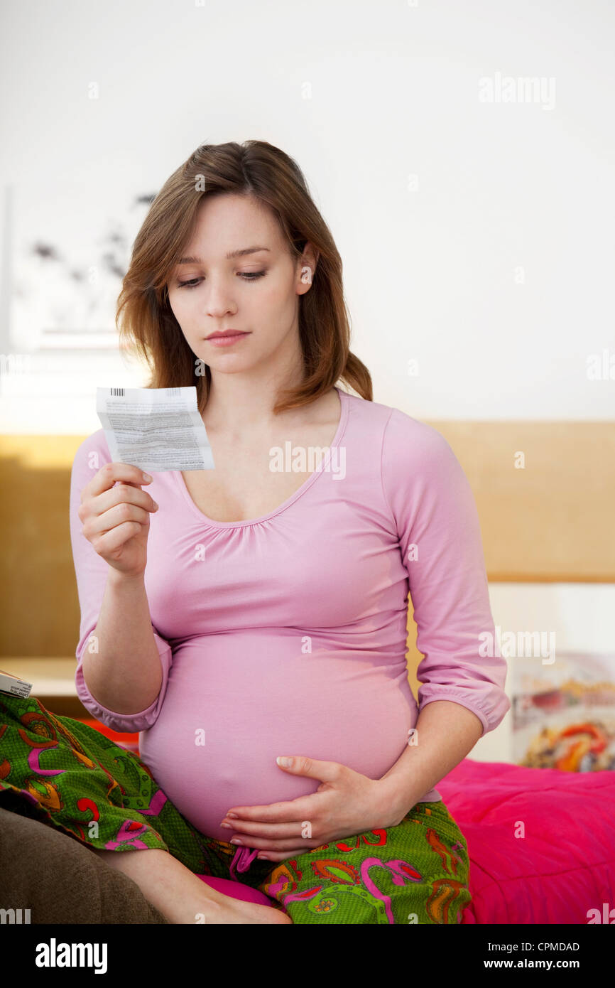 PREGNANT WOMAN TAKING MEDICATION Stock Photo Alamy