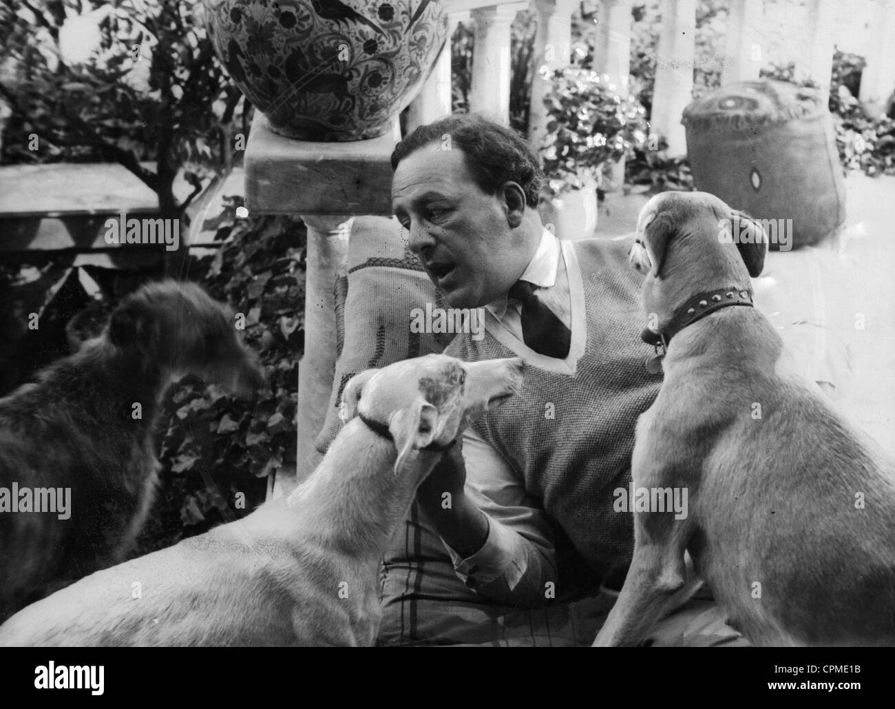 Emil Ludwig with dogs, 1932 Stock Photo