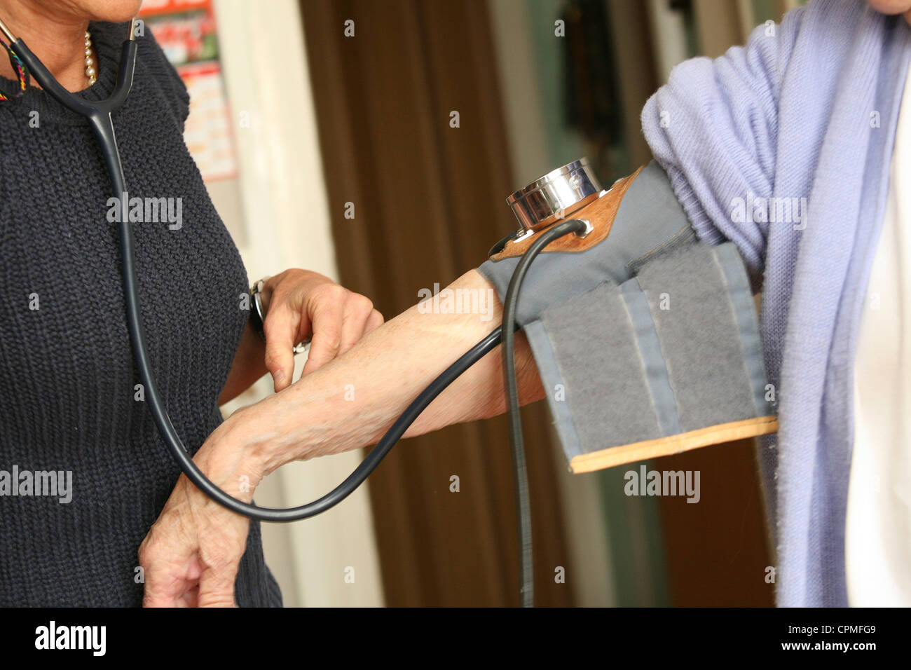 BLOOD PRESSURE, ELDERLY PERSON Stock Photo Alamy