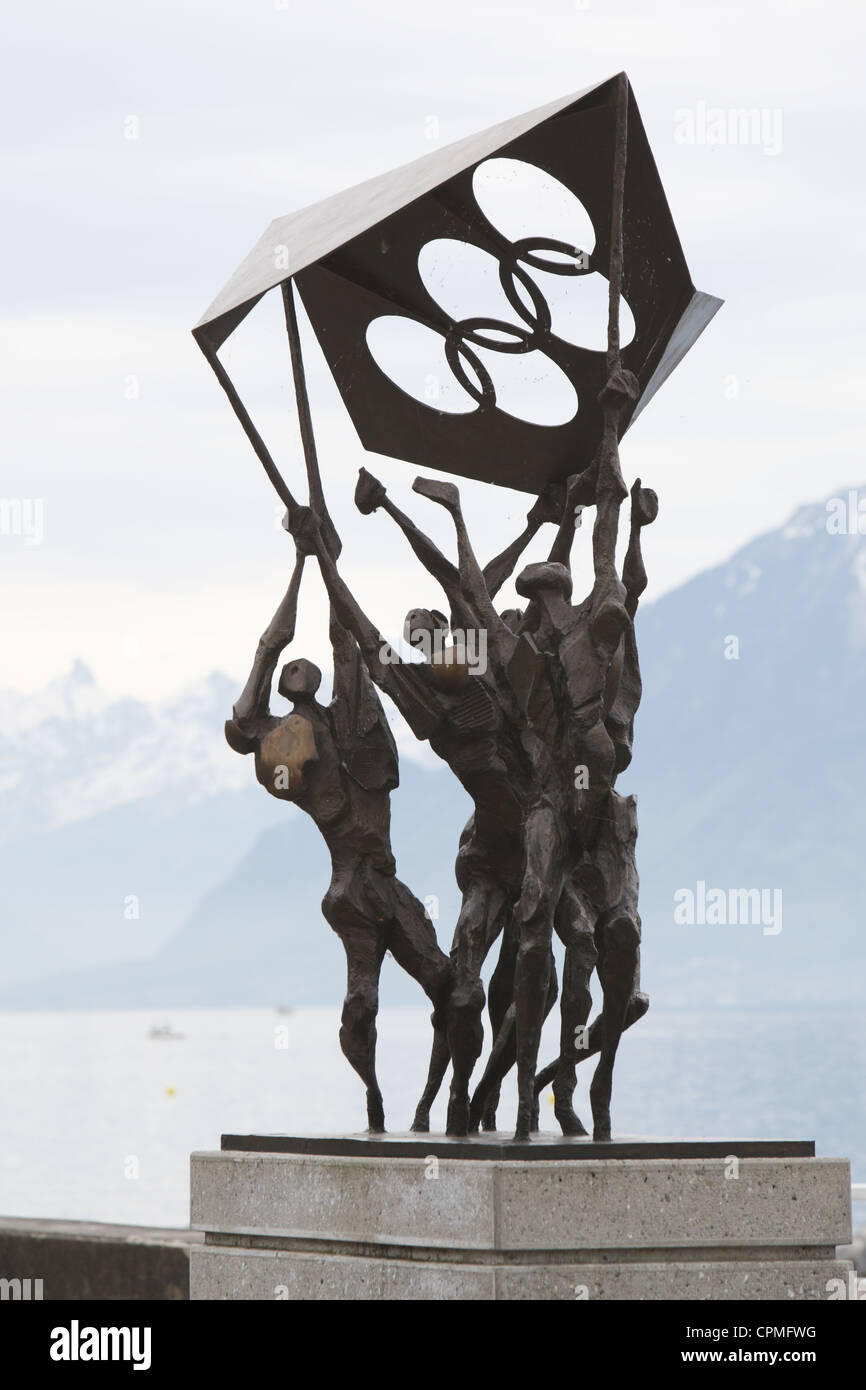 IOC Olympic sculpture on the edge of Lake Geneva from Ouchy waterfront in Lausanne, Vaud, Switzerland Stock Photo