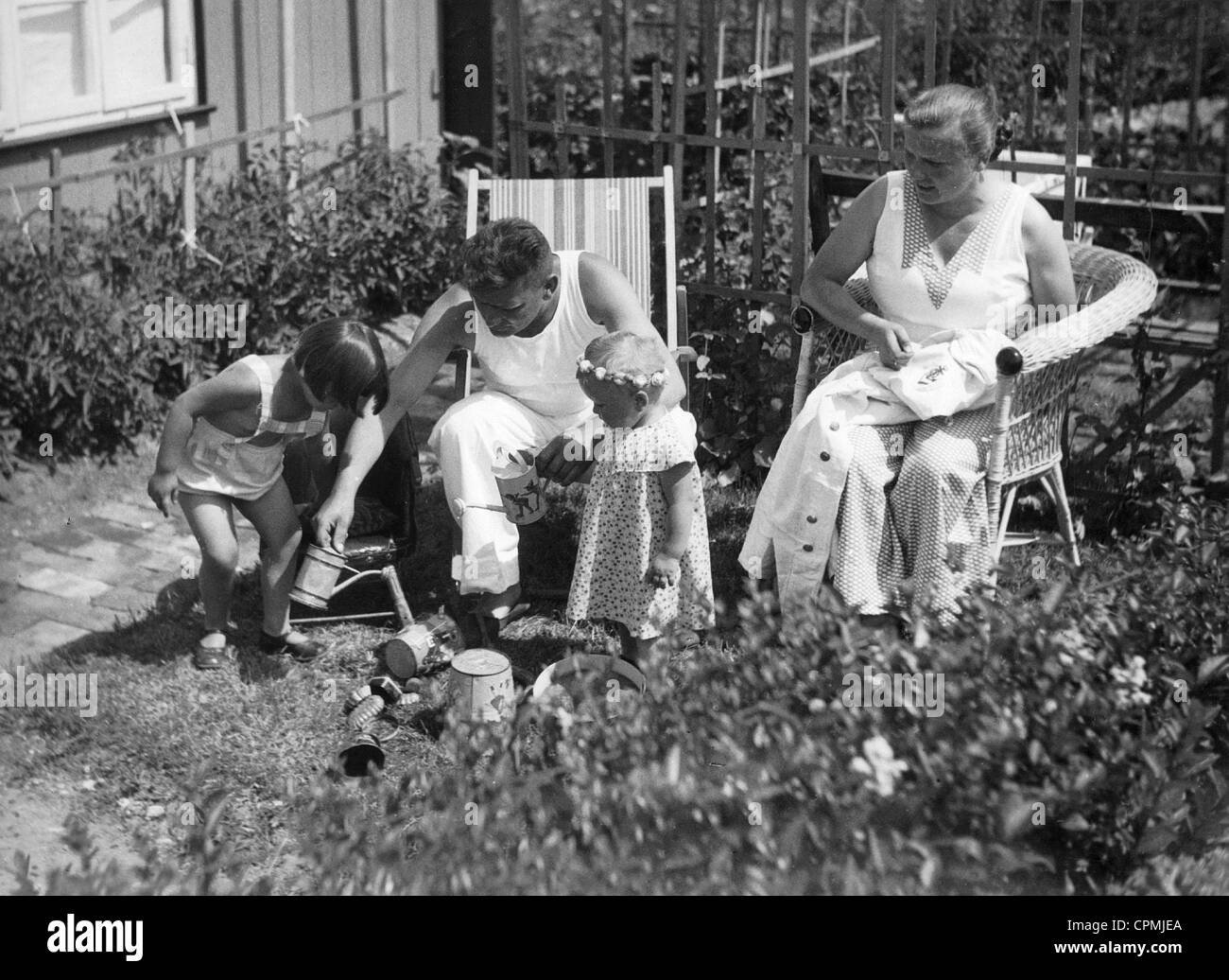 Family in the allotment garden, 1935 Stock Photo