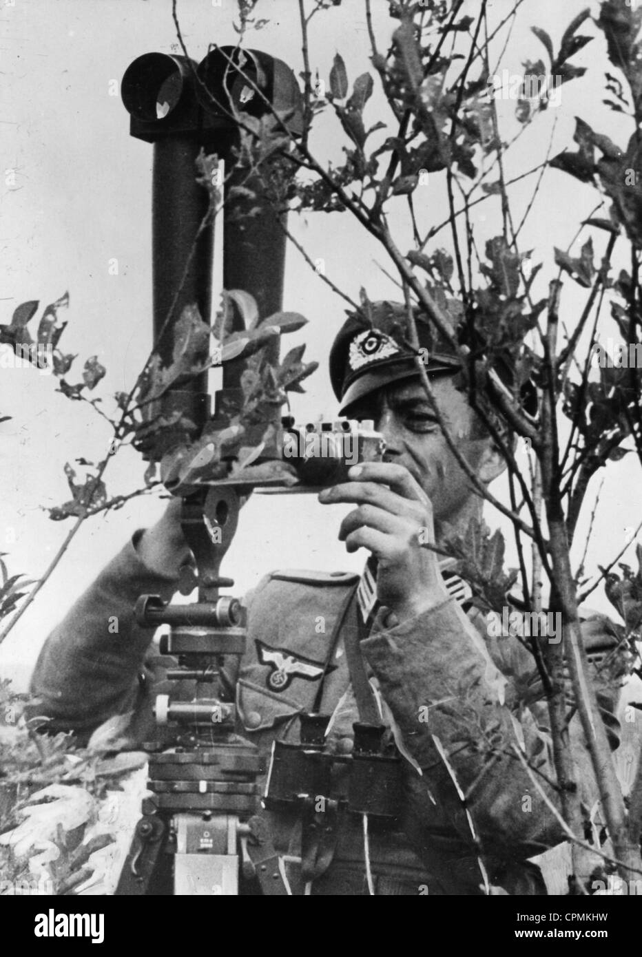 A German officer makes camera shots, 1942 Stock Photo