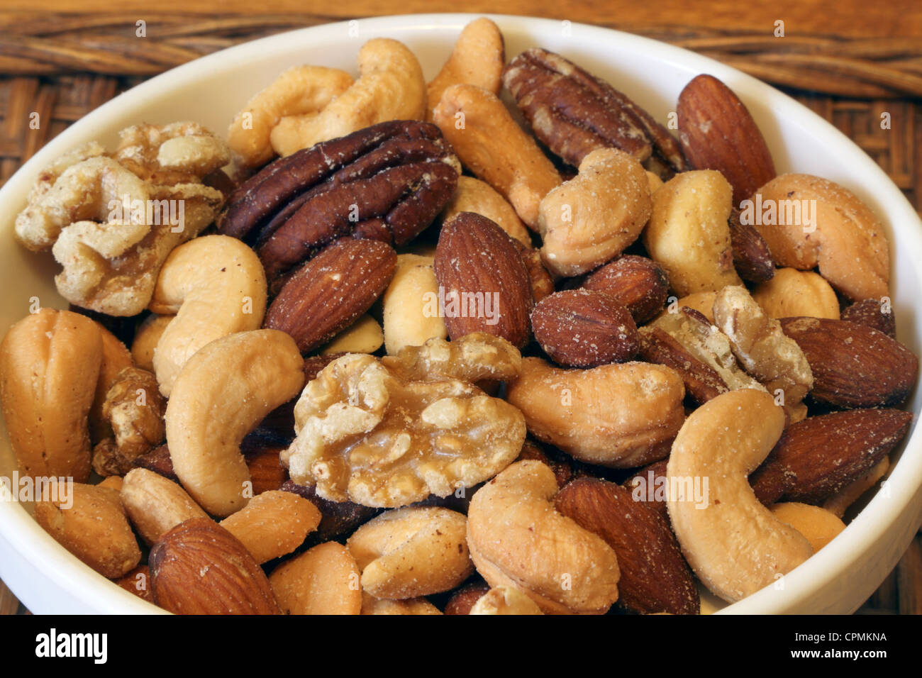 Mixed Nuts including Cashews, Pecans, Almonds and Walnuts Stock Photo