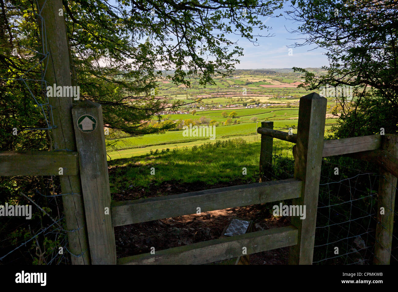 View over stile towards the Axe Valley, Musbury, Devon Stock Photo
