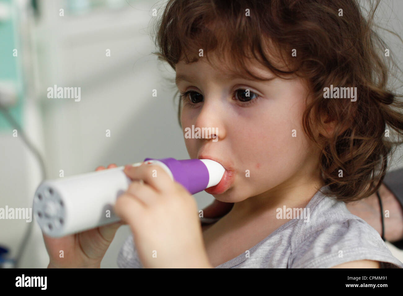 BREATHING, SPIROMETRY IN A CHILD Stock Photo