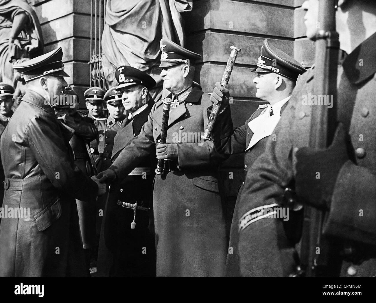 Adolf Hitler welcomes Erich Raeder, Wilhelm Keitel and Erhard Milch, 1942 Stock Photo