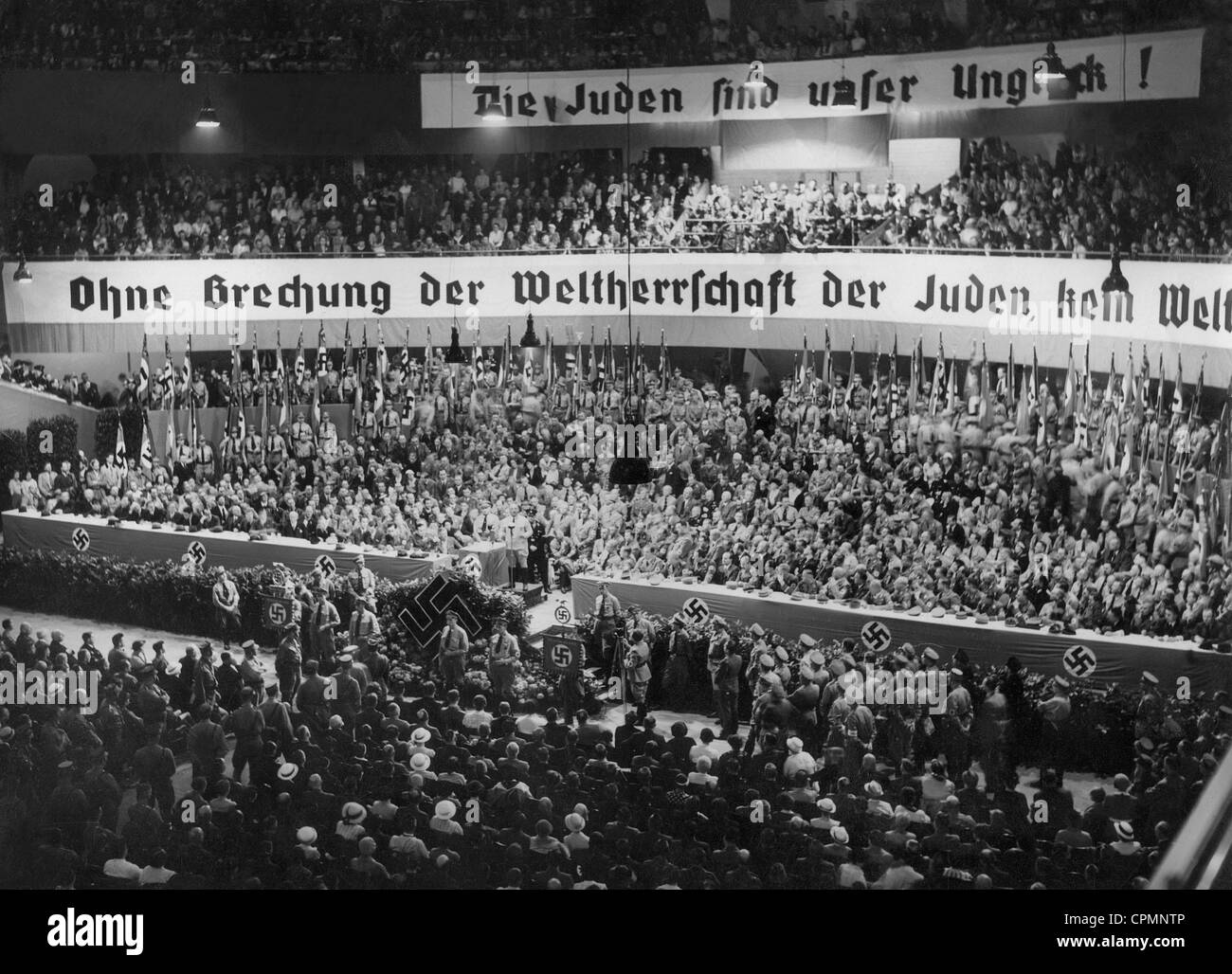 Interior of the Sportpalast in Berlin decorated with anti-semitic banners during a speech of Julius Streicher, Berlin, 15th Stock Photo