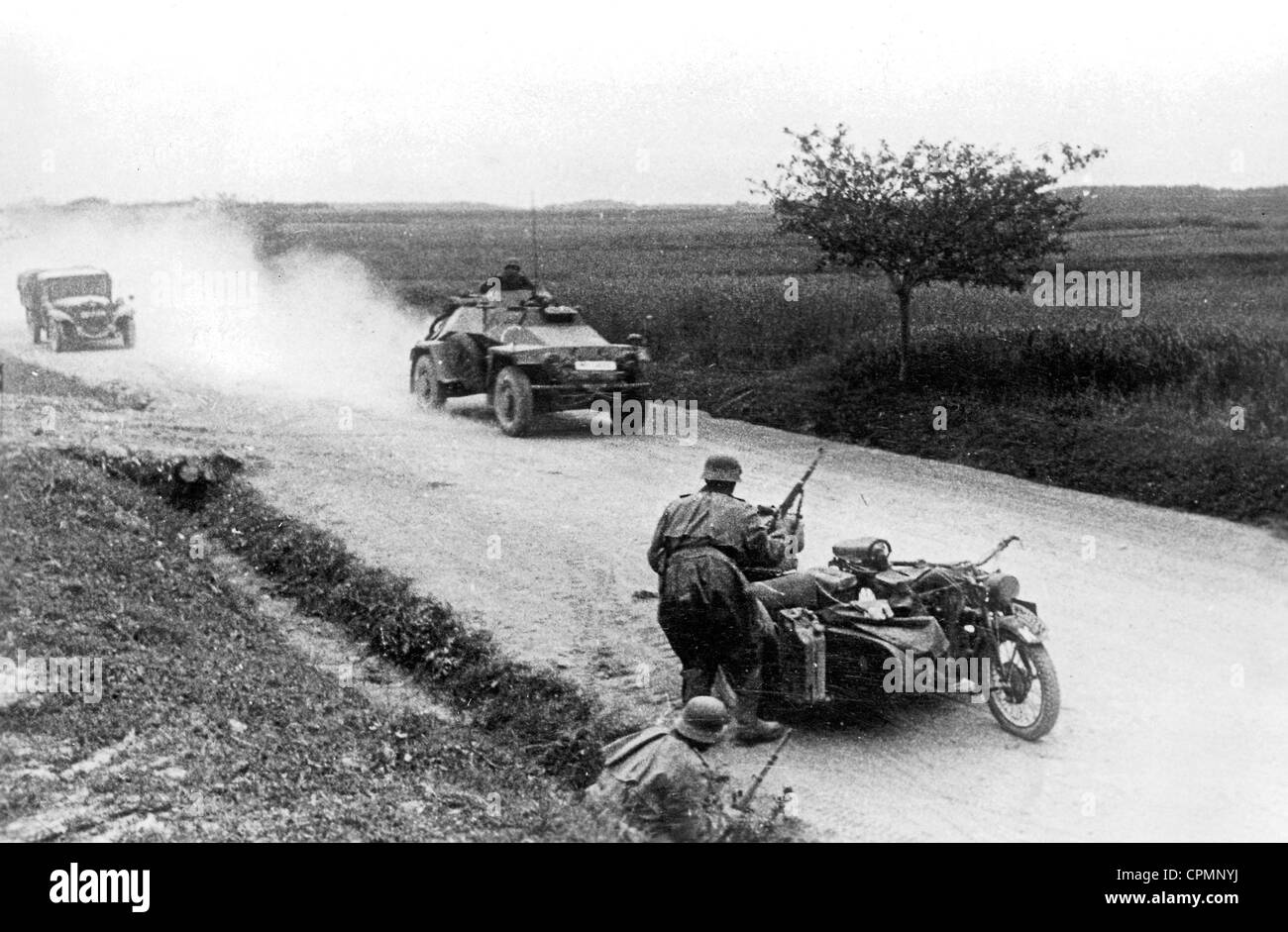 German armored reconnaissance vehicle and motorcyclist on the Eastern Front, 1941 Stock Photo