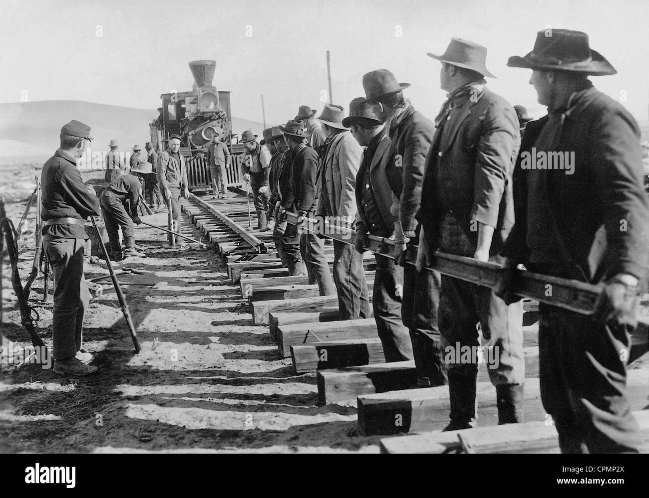 Construction of a railway line in the Wild West Stock Photo