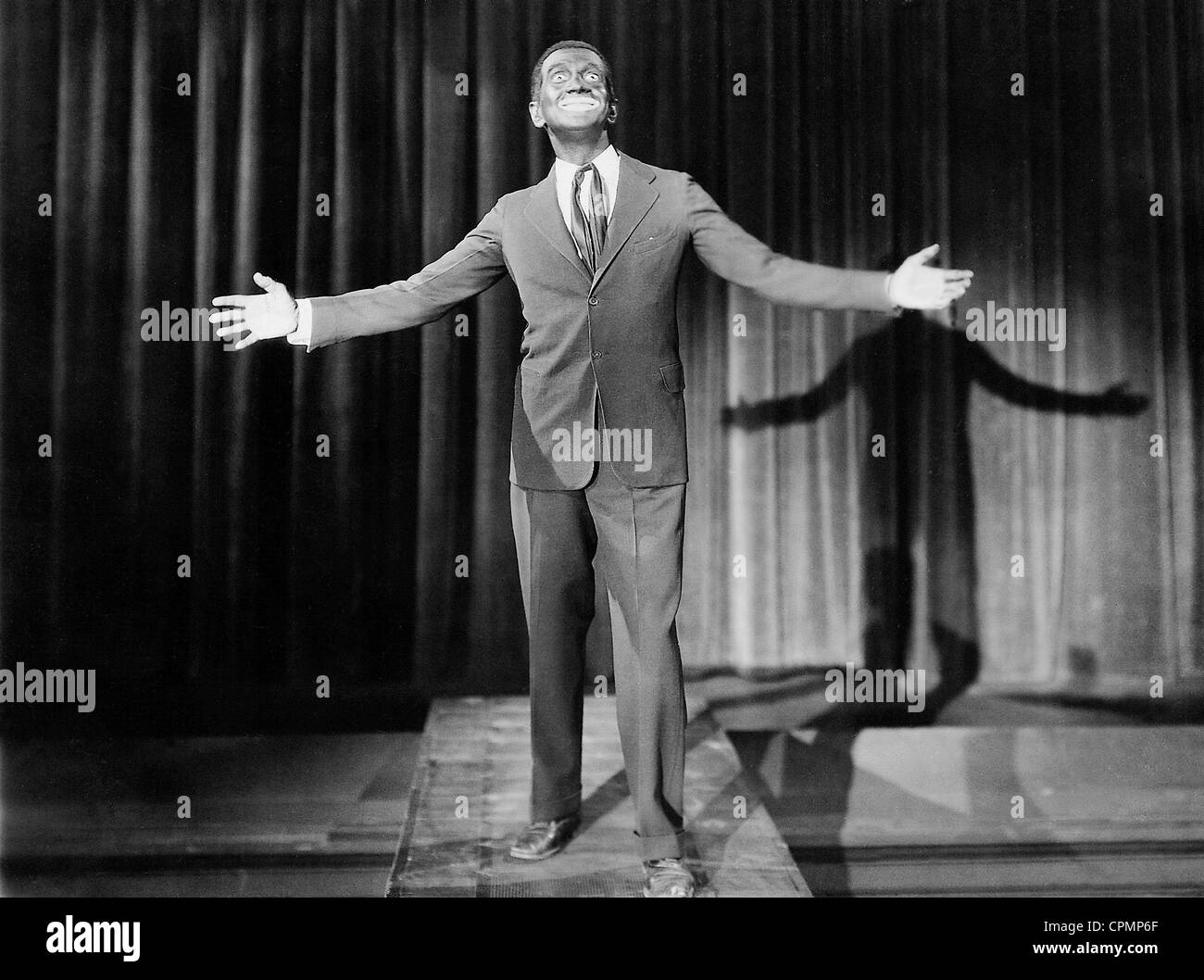 Al Jolson Playing a Piano While the Girl is Dancing in Classic Movie