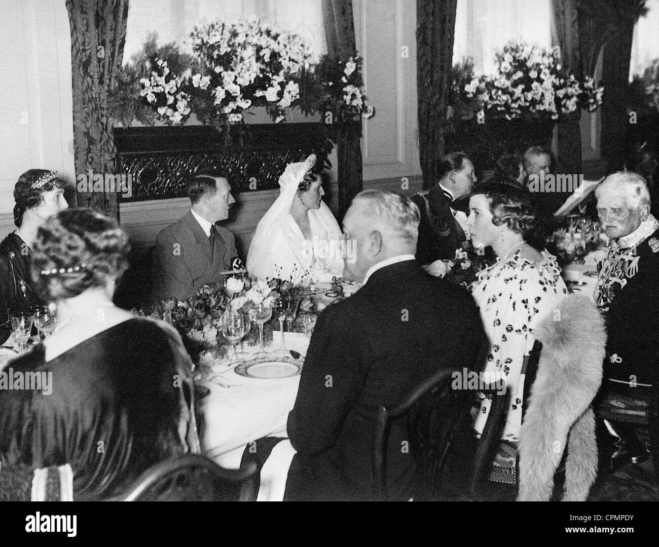 Adolf Hitler, Emmy Goring, Hermann Goring at the wedding banquet, 1935 Stock Photo