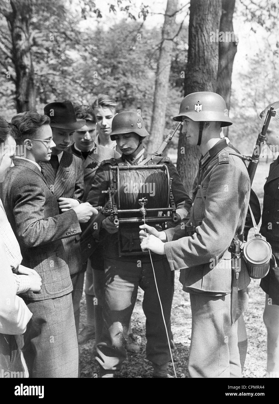 Students visit a signal unit of the Wehrmacht, 1942 Stock Photo