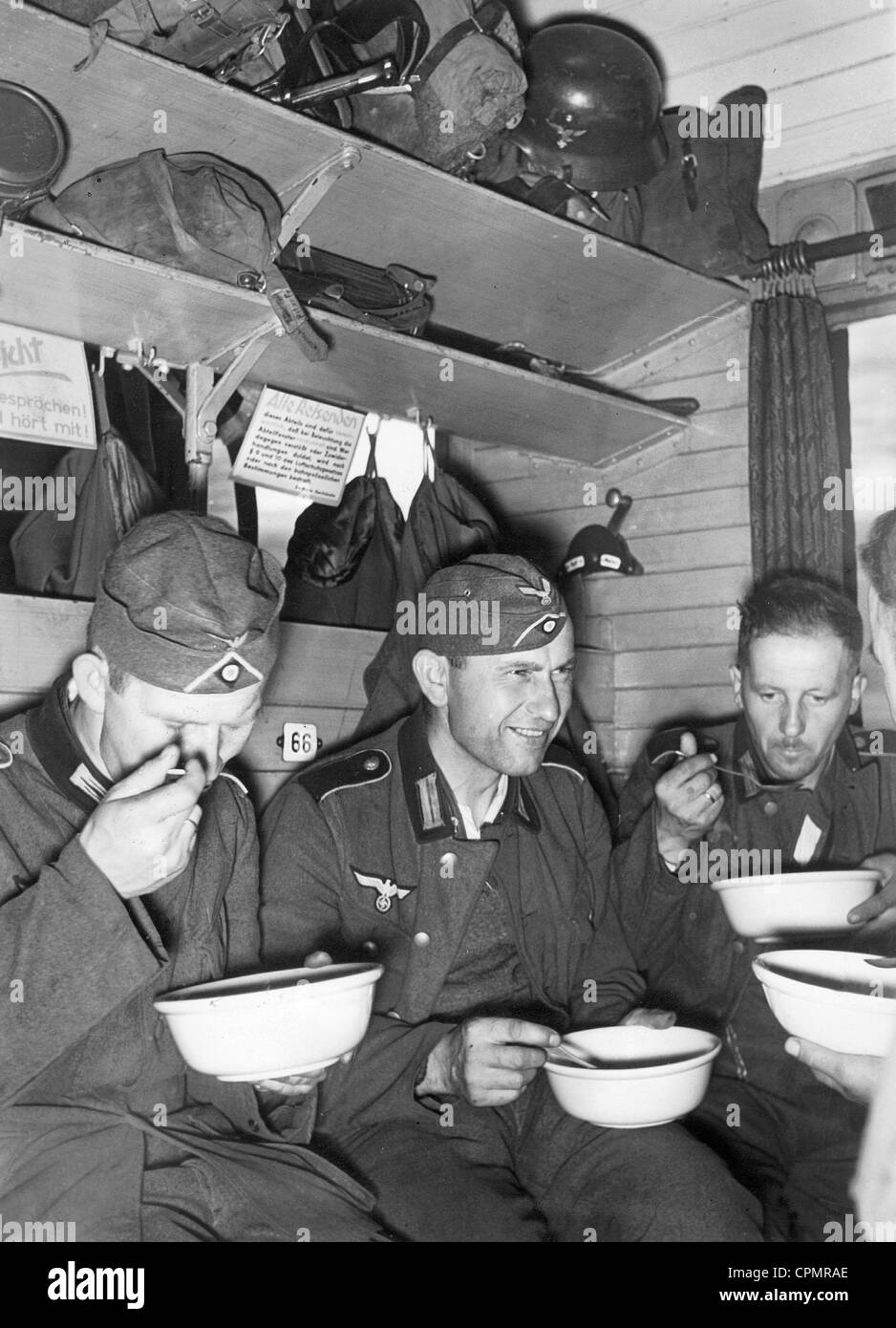 German soldiers eat in the train compartment, 1941 Stock Photo