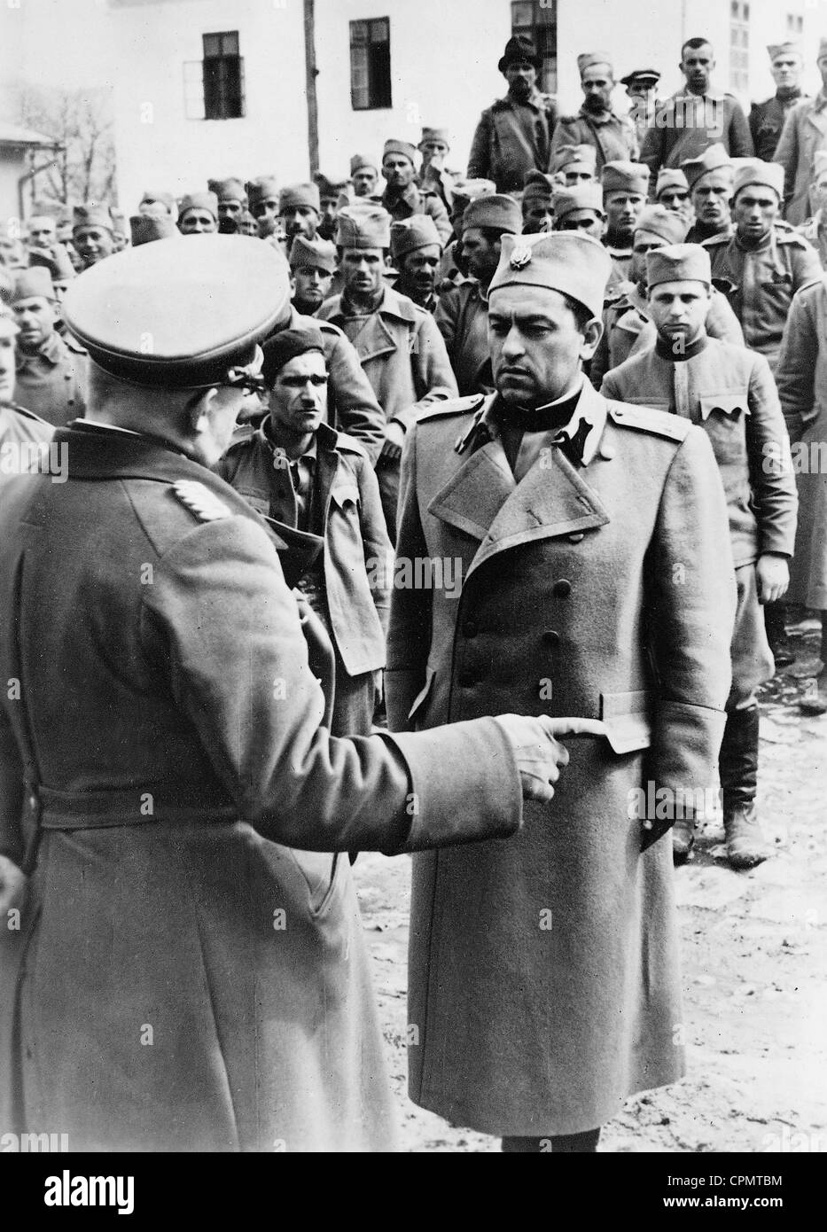 A German general announces the ceasefire to Yugoslav soldiers, 1941 Stock Photo