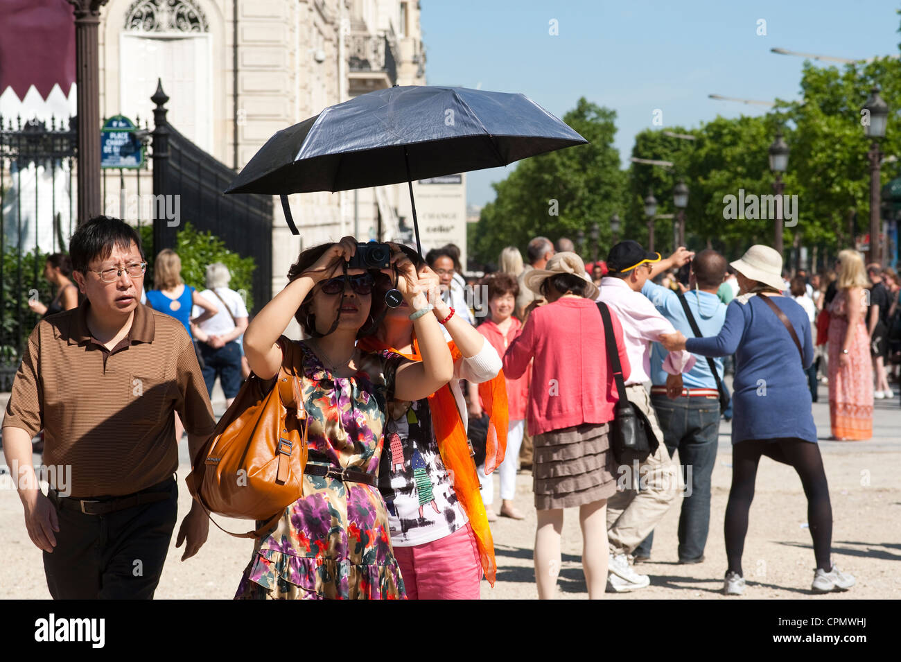 Paris, France - Japanese tourists taking photos Stock Photo