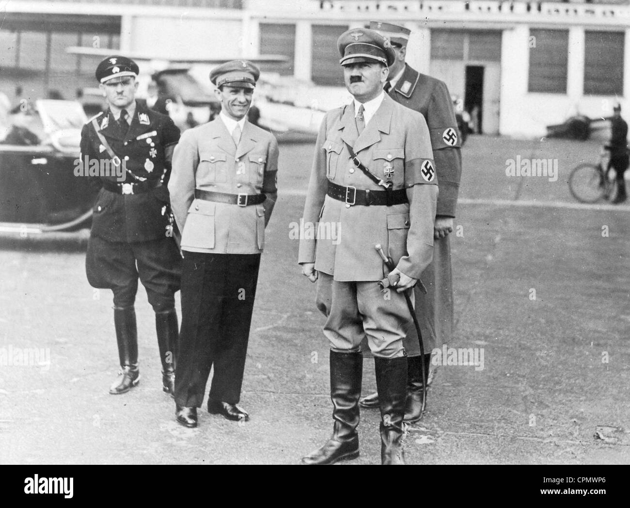 Sepp Dietrich, Joseph Goebbels and Adolf Hitler at Tempelhof airport, 1934 Stock Photo