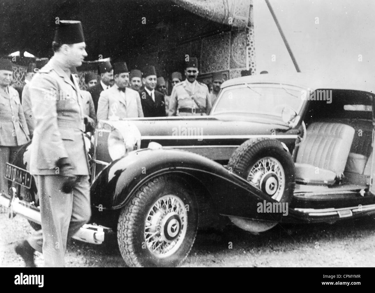 King Farouk of Egypt with a Mercedes which he received as a gift, 1938 Stock Photo