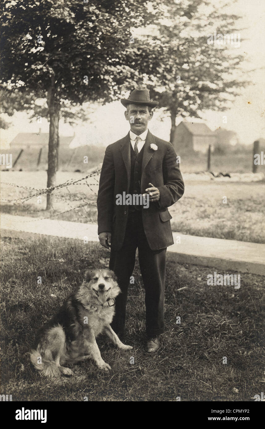 Elegant Middle Aged Man in the Country with his Collie Stock Photo