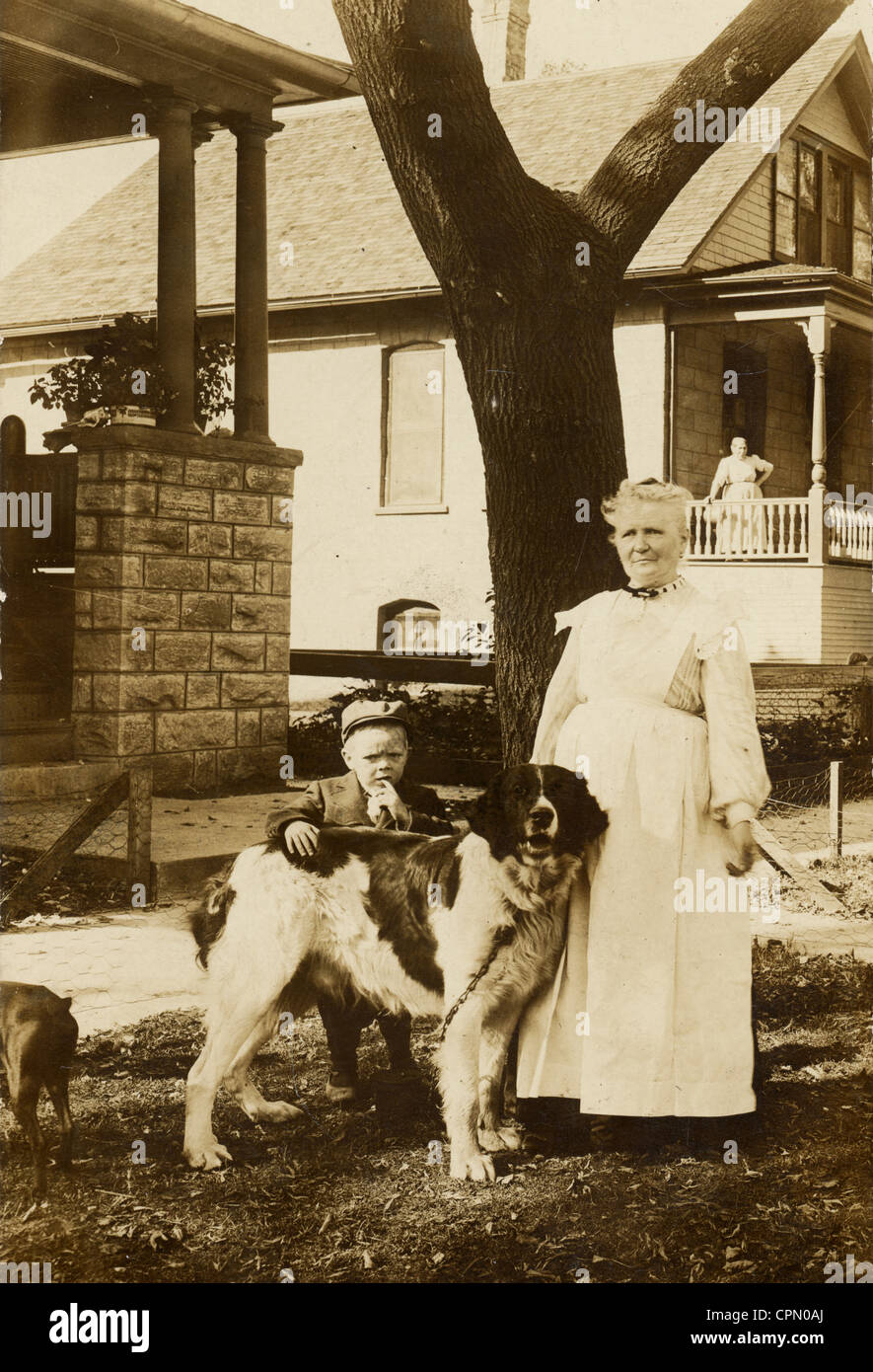 Grandmother & Grandson with St. Bernard Dog Stock Photo