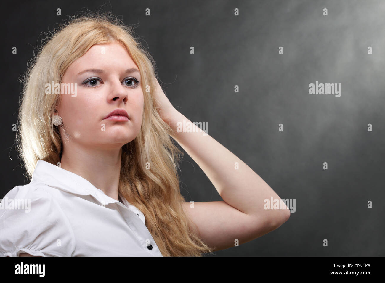Portrait of beautiful young blond woman Stock Photo - Alamy