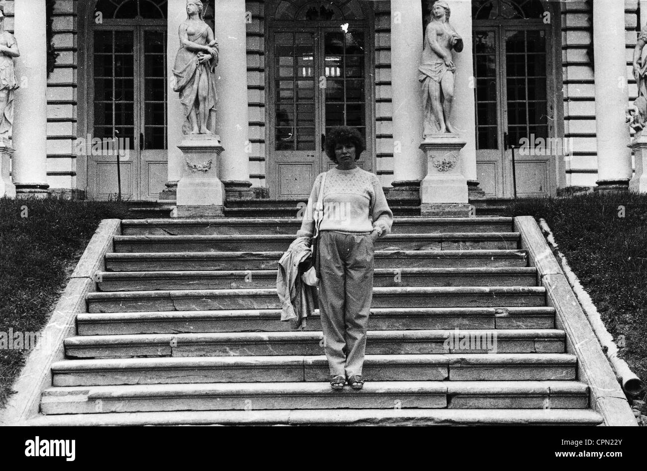 young woman on the steps of the royal palace at Peterhof, Leningrad, USSR, 1984 Stock Photo