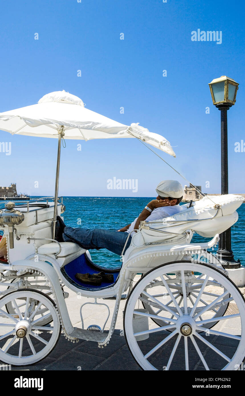 Europe Greece, Crete, a carriage for tourists in Chania Bay Stock Photo